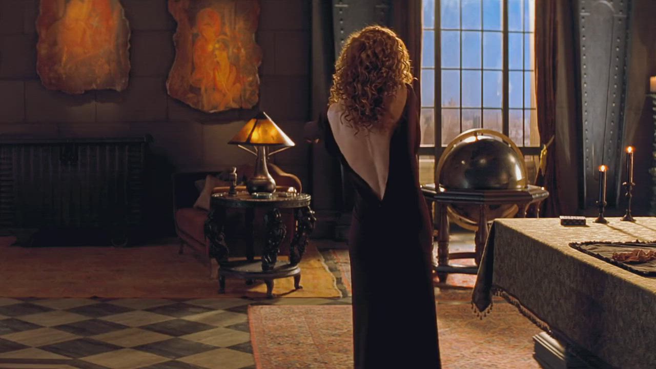 Redhead Connie Nielsen exposes body in celebs video scene from The Devil's Advocate