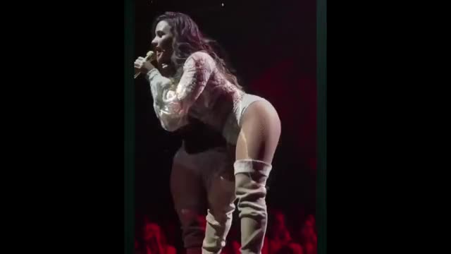 DEMI LOVATO bending over