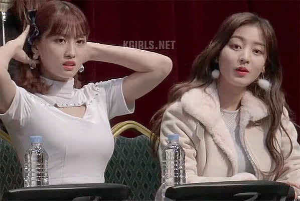 Jihyo and Momo showing off their assets