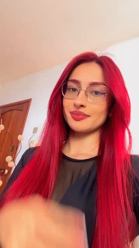 body bodysuit glasses myfreecams redhead tease teasing gif