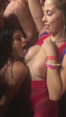 Sucking a boob at the club