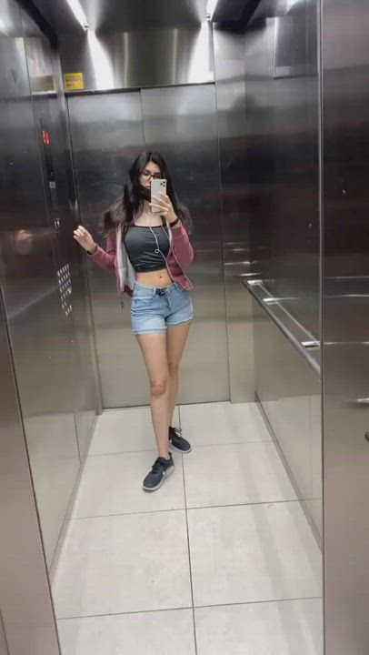 Brunette Elevator Mirror gif