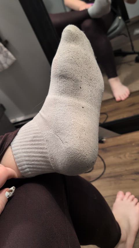 Stripping my sweaty sock after a long day out on my feet