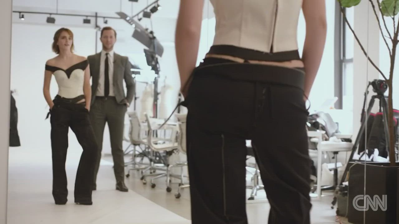 The camera man and the other guy both can't help but focus on Emma Watson's ass