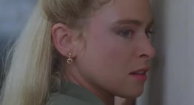 Corinna Everson frisks Alonna Shaw Double Impact 1991