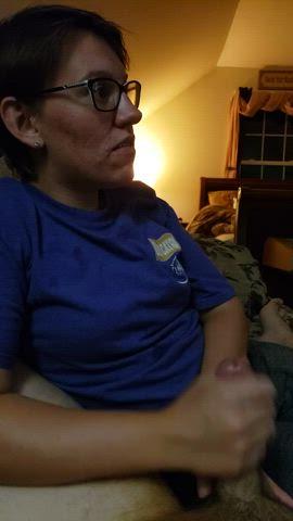 Stroking my cock while she watches TV