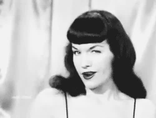 Bettie looking like she's got some naughty thoughts on her mind