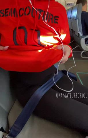 Risky boobies drop in airplane [gif]