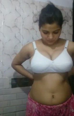 Cute Desi girl showing her huge melon in bathroom link in comment