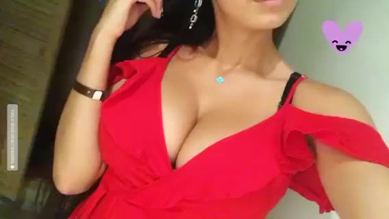 You gotta love the red dress with a lot of cleavage (GIF)