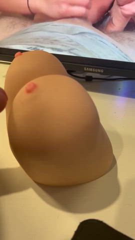 Unloading onto my titty toy