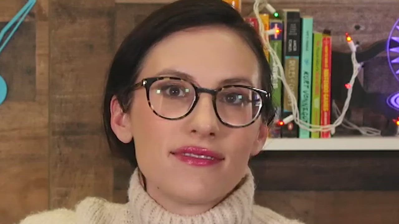 Stephanie with glasses and mouth opened