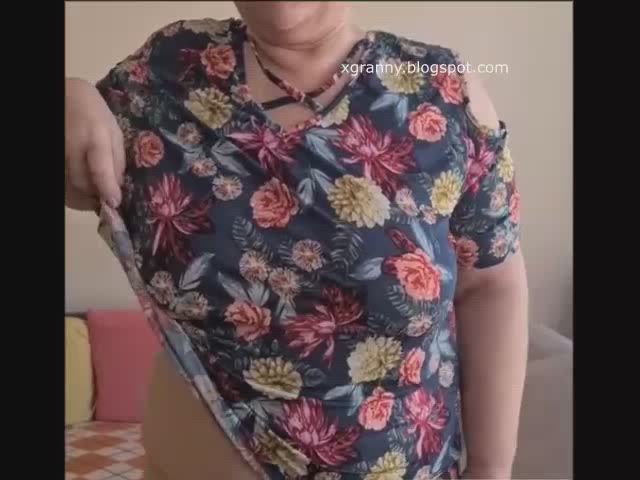 Titted grandma shows striptease