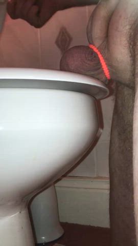 Toilet seat falling on balls