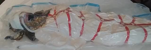 girl in bondage and vacuum bag