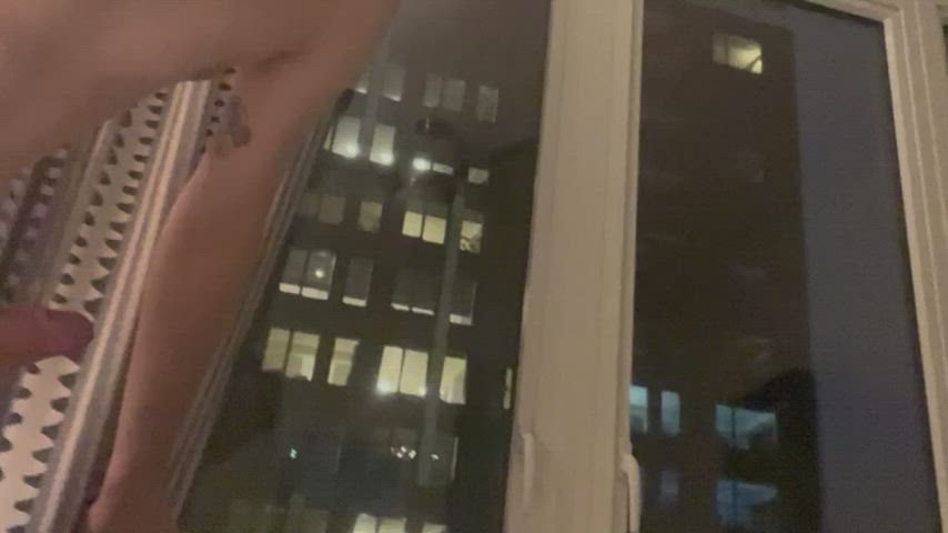 Solo Cumshot in Downtown Window