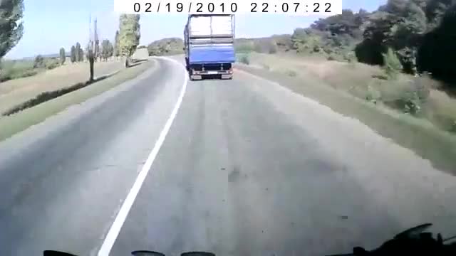 Motorcycle head-on collision with truck