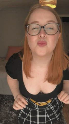 bouncing bouncing tits cleavage cute glasses innocent redhead skirt white girl gif