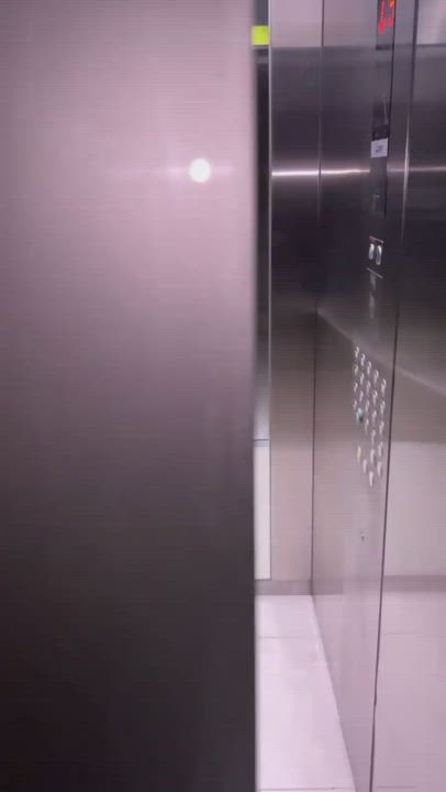 Brunette Elevator Mirror gif