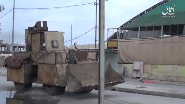 VBIED with mounted .50 cal turret bulldozes his way into Iraqi vehicles before detonation