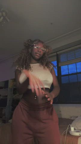 braless dancing ebony jiggling pierced pokies gif