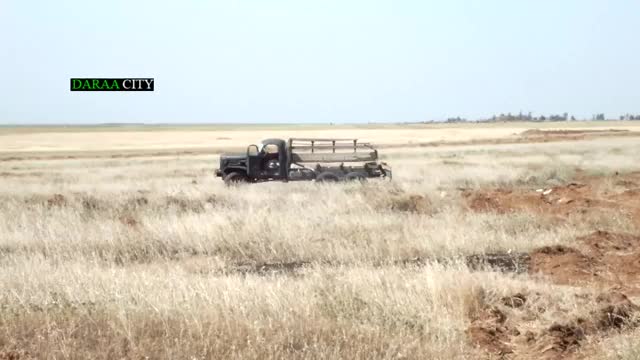 Destroyed SAA BMPs outside Darra