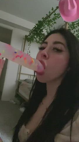 Throating her dildo