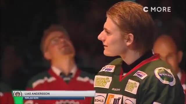 An emotional Lias Andersson watching his father, Niklas Andersson, getting his number
