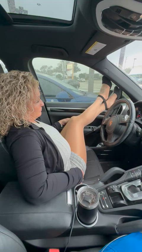 Hot mom in pantyhose waiting in the car