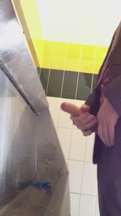 Cumming at the urinal