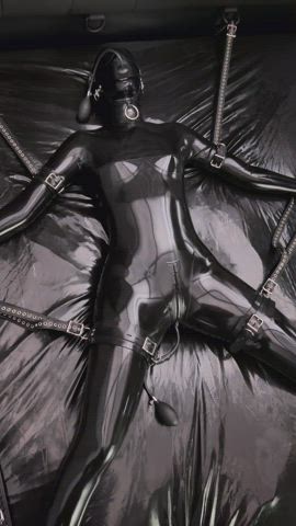 Latex full suit bondage