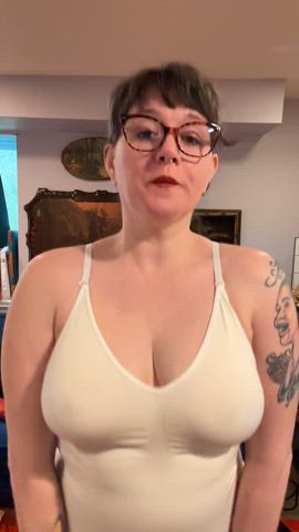 big tits bodysuit boobs brunette glasses tits gif