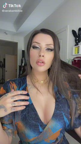 Cleavage Long Hair Tattoo gif