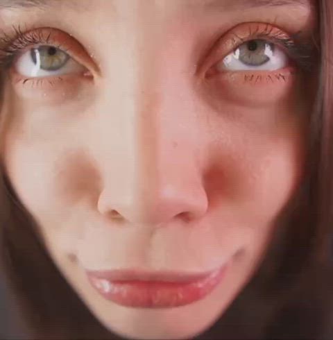 big eyes blonde close up face licking gif