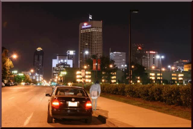 Hitching a ride at night in the city with panties lowered by Mark Heffron