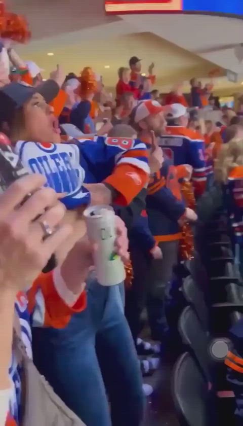 Edmonton Oilers fan flashing at the arena