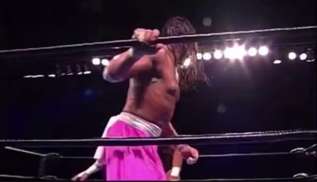 Sabu top rope face buster through a table