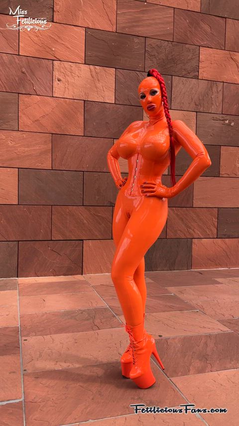 big tits catsuit corset heels high heels latex latex gloves mask public rubber gif