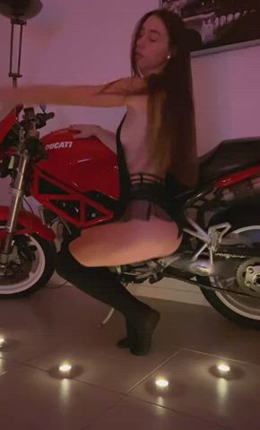 I am 19 years old and I dance very sexy with a motorcycle