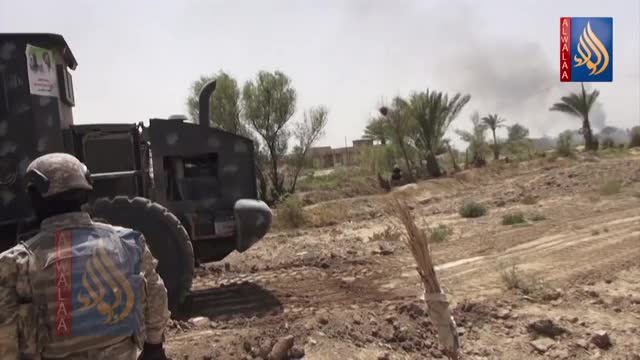 Iraqi bulldozer hit by an RPG while a news crew films - Iraq 2016