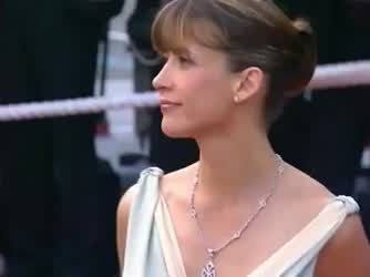 Sophie Marceau dress slid off (Photo in the comment)