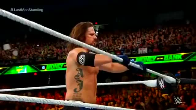 AJ Styles - Phenomenal Forearm through announce table