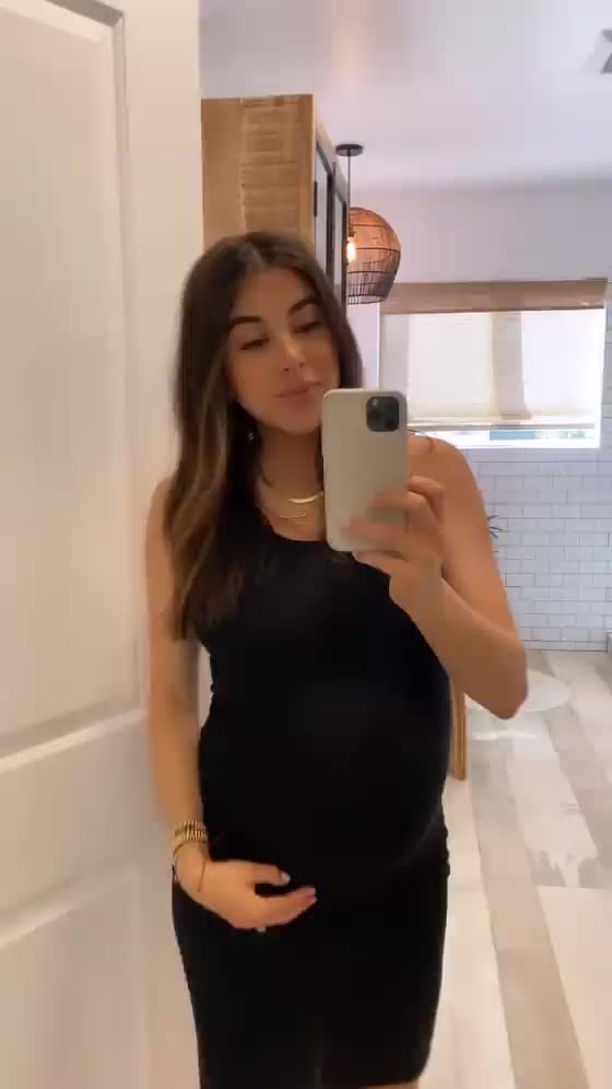 Daniella Monet pregnant dress