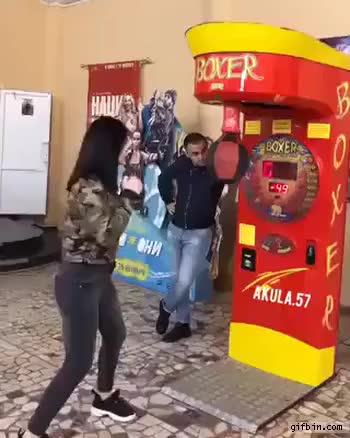 girl-on-punching-bag-machine