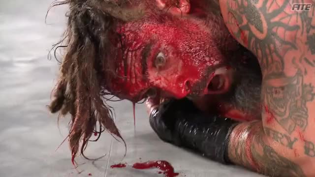 Jay Briscoe bleeds blood