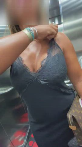 amateur big tits boobs busty elevator flashing milf tits titty drop gif