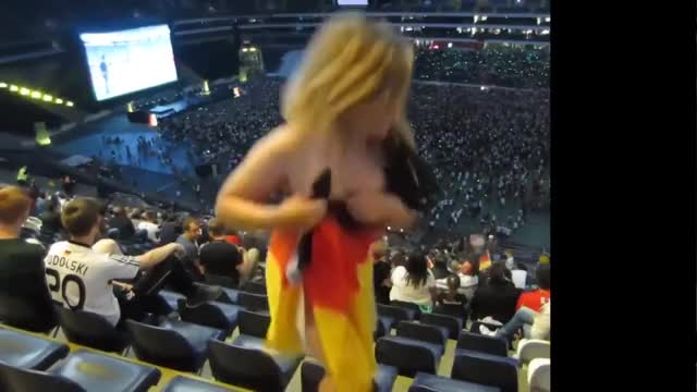 Blonde Flashing at a Stadium