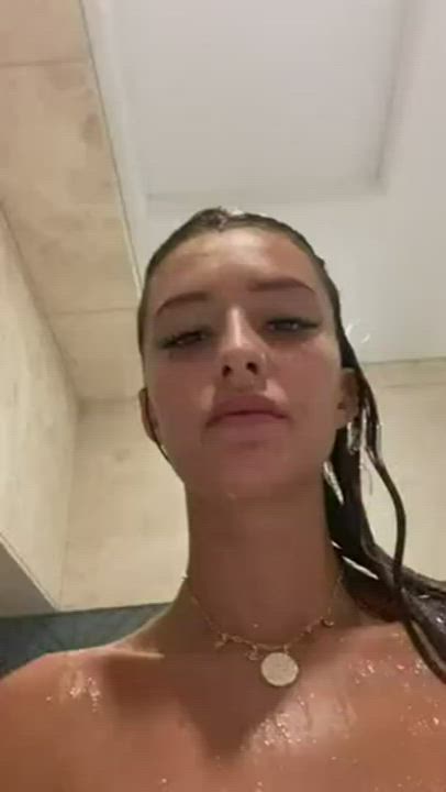 Tanned Leggy Lass Showering