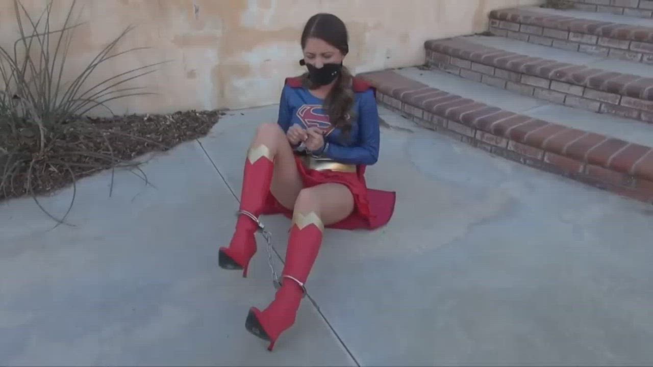 Super Girl captured and put into bondage.