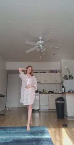 Petite Redhead Undressing gif